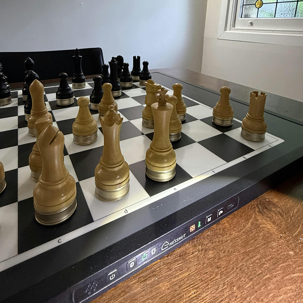 Advanced robotic chessboard with wooden chess pieces